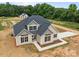 Aerial view of a home with a well-maintained dark roof, and manicured front lawn at 4949 Rimer Rd # 4, Concord, NC 28025