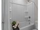 Bathroom featuring a white tub and shower combo with chrome hardware at 4949 Rimer Rd # 4, Concord, NC 28025