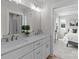 Bright bathroom with double sinks, quartz countertop and modern fixtures at 4949 Rimer Rd # 4, Concord, NC 28025