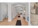 Welcoming entryway with hardwood floors provides seamless access to the various rooms at 4949 Rimer Rd # 4, Concord, NC 28025