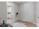 Charming entryway with coat rack and view into the modern kitchen at 4949 Rimer Rd # 4, Concord, NC 28025