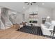 Cozy living room with vaulted ceilings, a modern fireplace, comfortable seating, and stylish decor at 4949 Rimer Rd # 4, Concord, NC 28025