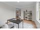 Office space features a desk, chair, bookshelf, and a light gray rug at 4949 Rimer Rd # 4, Concord, NC 28025