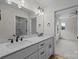 Bathroom with dual sinks, large mirror, and modern lighting at 4975 Rimer Rd # 1, Concord, NC 28025