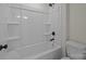 Bathroom featuring a shower and tub combination with bright white tiling at 4975 Rimer Rd # 1, Concord, NC 28025