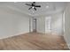 Spacious bedroom with hardwood floors, tray ceiling, and natural light at 4975 Rimer Rd # 1, Concord, NC 28025
