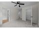 Bedroom with neutral carpet offering access to closet space and other rooms in the house at 4975 Rimer Rd # 1, Concord, NC 28025