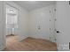 Hallway with an office/kitchenette on the left and a room to the right at 4975 Rimer Rd # 1, Concord, NC 28025