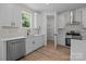 Bright kitchen with stainless steel appliances, pantry and hardwood floors at 4975 Rimer Rd # 1, Concord, NC 28025