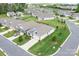 Neighborhood aerial showcasing manicured lawns, tree-lined streets, and well-spaced homes at 5058 Antebellum Dr, Iron Station, NC 28080