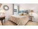 Bedroom with a decorated headboard, side tables, and a window at 5058 Antebellum Dr, Iron Station, NC 28080