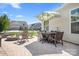 Backyard featuring a beautiful stone patio with a fire pit, dining area, and relaxing outdoor ambiance at 5058 Antebellum Dr, Iron Station, NC 28080