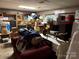 Cluttered basement with boxes, furniture, and stored items; ample storage potential at 5198 Wright Dr, Hickory, NC 28602