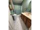 Bathroom with a shower-tub combination and a single sink vanity with marble flooring at 5198 Wright Dr, Hickory, NC 28602