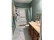 Bathroom featuring a shower, vanity, and marble floors at 5198 Wright Dr, Hickory, NC 28602