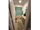 Bathroom with a shower-tub combination and a vanity sink with tiled floors at 5198 Wright Dr, Hickory, NC 28602
