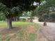 Brick home with a well-maintained lawn, a wooden deck, and an attached garage at 5198 Wright Dr, Hickory, NC 28602