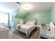 Comfortable bedroom featuring a comfy bed, soft carpet, and a baby crib at 556 Knighton Hill Rd, Rock Hill, SC 29732