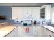 Well-appointed kitchen with white cabinetry and a range, great for culinary enthusiasts at 556 Knighton Hill Rd, Rock Hill, SC 29732