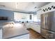 Bright kitchen featuring white cabinetry, stainless steel appliances, and open counter space at 556 Knighton Hill Rd, Rock Hill, SC 29732
