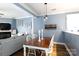 Open-concept living and dining area with dining table, chairs, and comfortable seating at 556 Knighton Hill Rd, Rock Hill, SC 29732