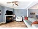 Open living area features a cozy fireplace, hardwood floors, and a comfortable seating arrangement at 556 Knighton Hill Rd, Rock Hill, SC 29732