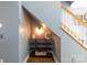 Cozy storage area with shelving nestled under the staircase at 556 Knighton Hill Rd, Rock Hill, SC 29732