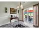 Bright dining area with sliding glass doors leading to a patio and backyard at 6192 Kilchurn Dr, Fort Mill, SC 29707