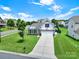 Charming two-story home with stone accents, well-manicured lawn, and a welcoming two-car garage at 6192 Kilchurn Dr, Fort Mill, SC 29707