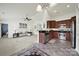 Open-concept living space connecting the kitchen, dining, and living room for modern living at 6192 Kilchurn Dr, Fort Mill, SC 29707