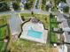 Aerial view of community pool featuring a bathhouse, a smaller pool and plenty of lounge chairs at 6192 Kilchurn Dr, Fort Mill, SC 29707