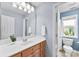Light and bright bathroom featuring a single sink vanity with an adjacent toilet room at 6300 Latta Springs Cir, Huntersville, NC 28078