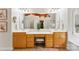 Bathroom vanity area with a large mirror, dual sinks, and ample storage at 6300 Latta Springs Cir, Huntersville, NC 28078