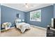 Calming bedroom with neutral tones, offering a cozy retreat for relaxation and restful nights of sleep at 6300 Latta Springs Cir, Huntersville, NC 28078