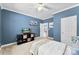 Stylish bedroom with ample space, offering a comfortable setting for relaxation and peaceful nights of sleep at 6300 Latta Springs Cir, Huntersville, NC 28078