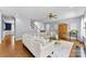 Open-concept living room with hardwood floors and a staircase at 6300 Latta Springs Cir, Huntersville, NC 28078