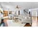 Spacious living room with a ceiling fan and hardwood floors at 6300 Latta Springs Cir, Huntersville, NC 28078