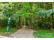 Gravel walking trail winding through the woods provides a serene escape at 6300 Latta Springs Cir, Huntersville, NC 28078