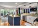 The bright dining area features large windows offering great views and natural light at 8619 New Oak Ln, Huntersville, NC 28078