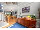 Spacious foyer featuring hardwood floors and staircase leading to a cozy living room at 8619 New Oak Ln, Huntersville, NC 28078