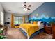 The main bedroom is complete with mountain-themed decor and plenty of natural light at 8619 New Oak Ln, Huntersville, NC 28078