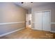 Neutral bedroom featuring carpet and closet. Clean bedroom with natural light creates a relaxing atmosphere at 1009 Brookline Dr, Huntersville, NC 28078