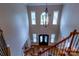 Foyer boasting a view of the ornate double door, hardwood floors, and a statement chandelier at 1009 Brookline Dr, Huntersville, NC 28078