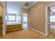 Second floor hallway with carpeted floor, and multiple doorways that lead to other rooms of the house at 1009 Brookline Dr, Huntersville, NC 28078
