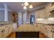 Spacious kitchen with island, granite countertops and custom cabinets at 1009 Brookline Dr, Huntersville, NC 28078