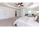 This main bedroom offers an abundance of space, natural light, and an adjoining seating area at 10112 Andres Duany Dr, Huntersville, NC 28078