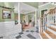Grand two-story foyer with elegant columns, black and white marble tile, and views into adjacent living spaces at 103 Samuel Guilford Ct, Charlotte, NC 28270