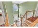 Elevated view of the foyer showcasing high ceilings, a staircase, and natural light at 103 Samuel Guilford Ct, Charlotte, NC 28270