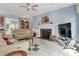 Cozy living room showcasing a fireplace, built-in shelving, and comfortable seating at 103 Samuel Guilford Ct, Charlotte, NC 28270