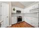 Modern kitchen with white cabinets, stainless steel appliances, and a subway tile backsplash, creating a clean and stylish cooking space at 114 Nevis Ln, Mooresville, NC 28115